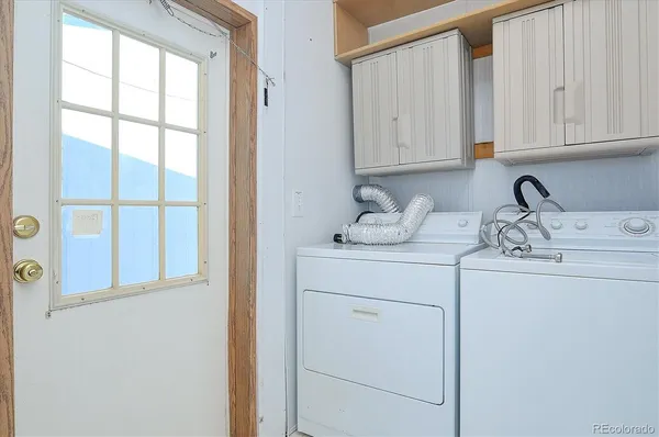 a bathroom with a sink and cabinets