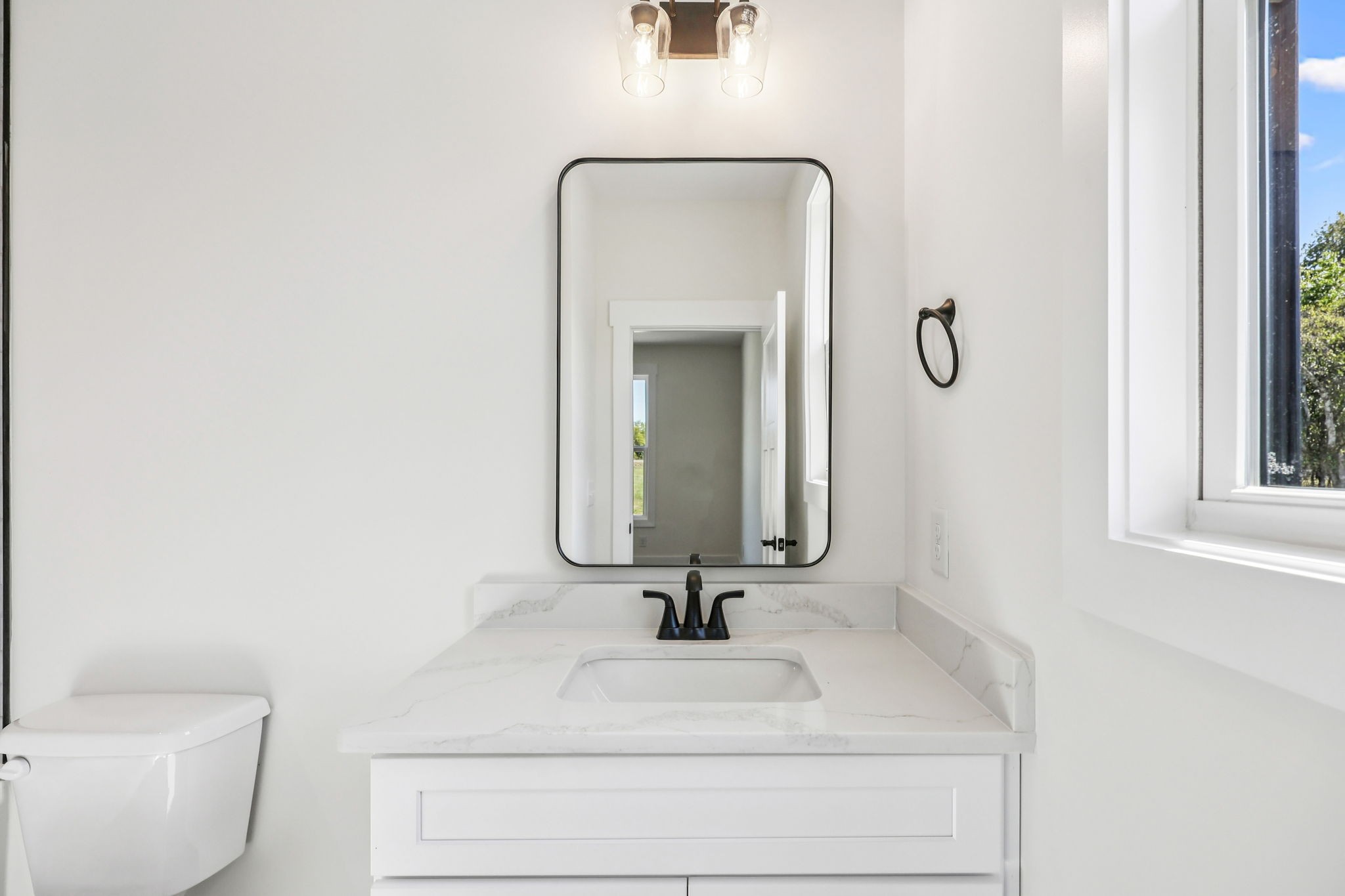 4050 Chicken Road Lebanon, TN 37090 - Photo 36 of 65 a bathroom with a sink and a mirror