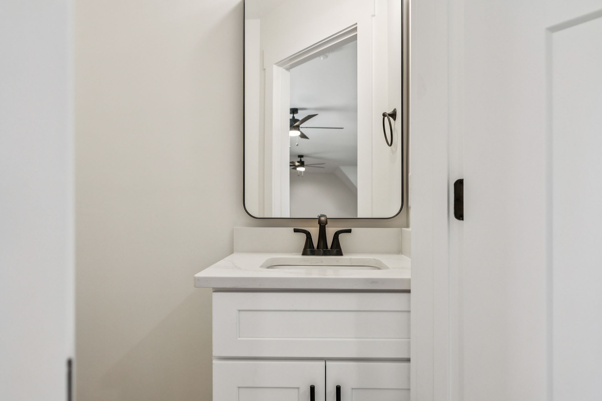 4050 Chicken Road Lebanon, TN 37090 - Photo 51 of 65 a bathroom with a sink and a mirror