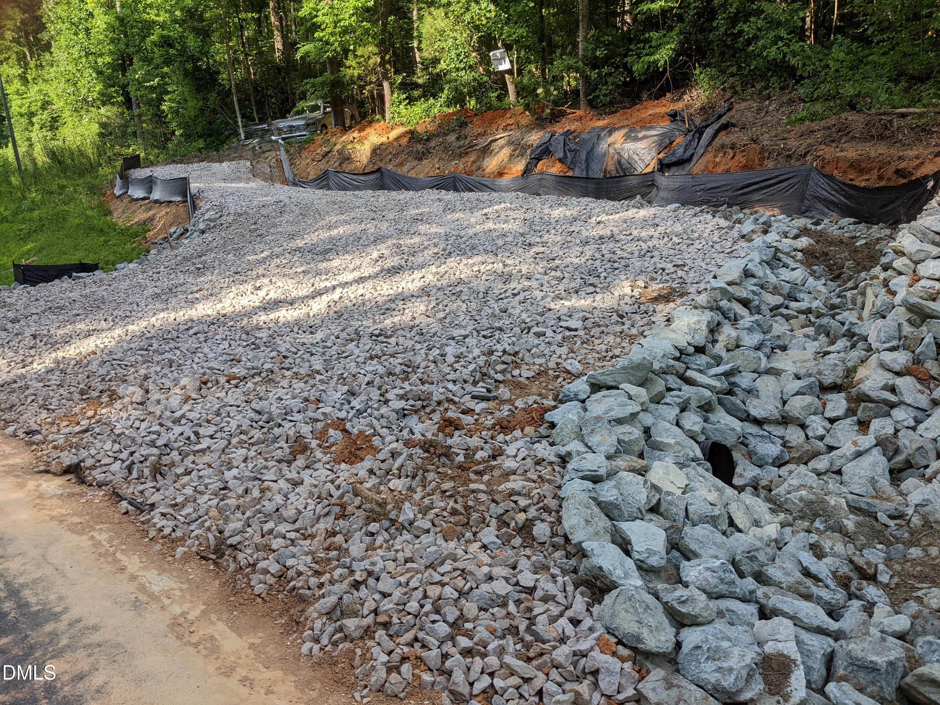 318 Jones Ferry Road Pittsboro, NC 27312 - Photo 14 of 17 a view of a dry yard with wooden fence