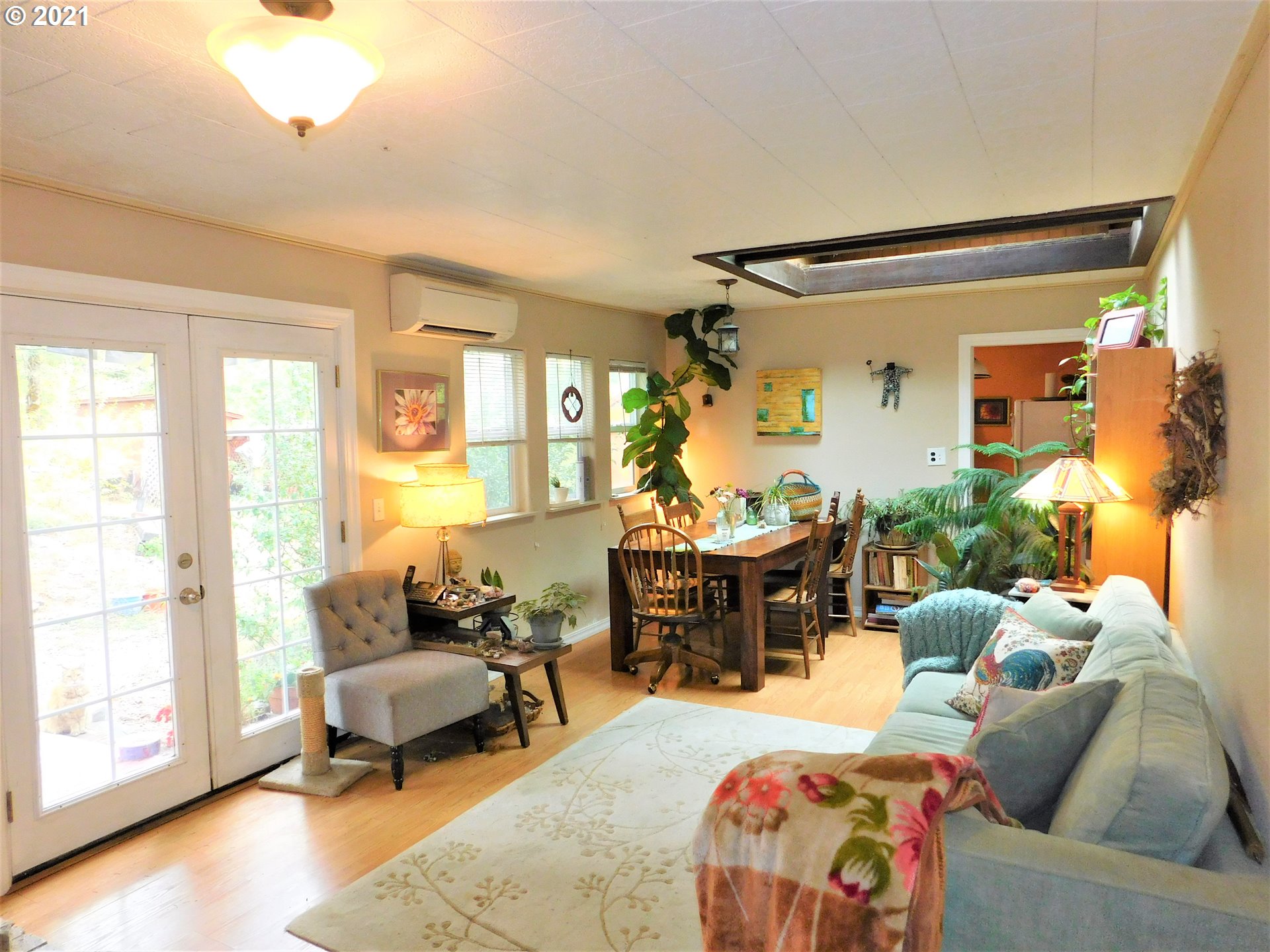 37824 Row River Road Dorena, OR 97434 - Photo 2 of 25 a living room with furniture and a large window