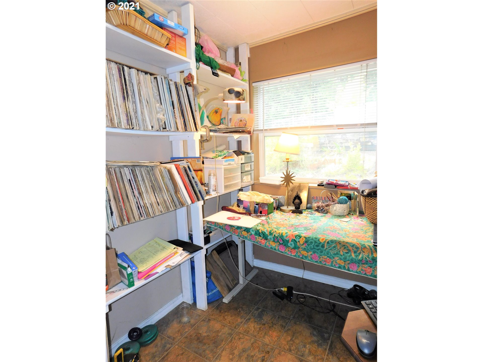 37824 Row River Road Dorena, OR 97434 - Photo 11 of 25 a room with a table chairs and a bed