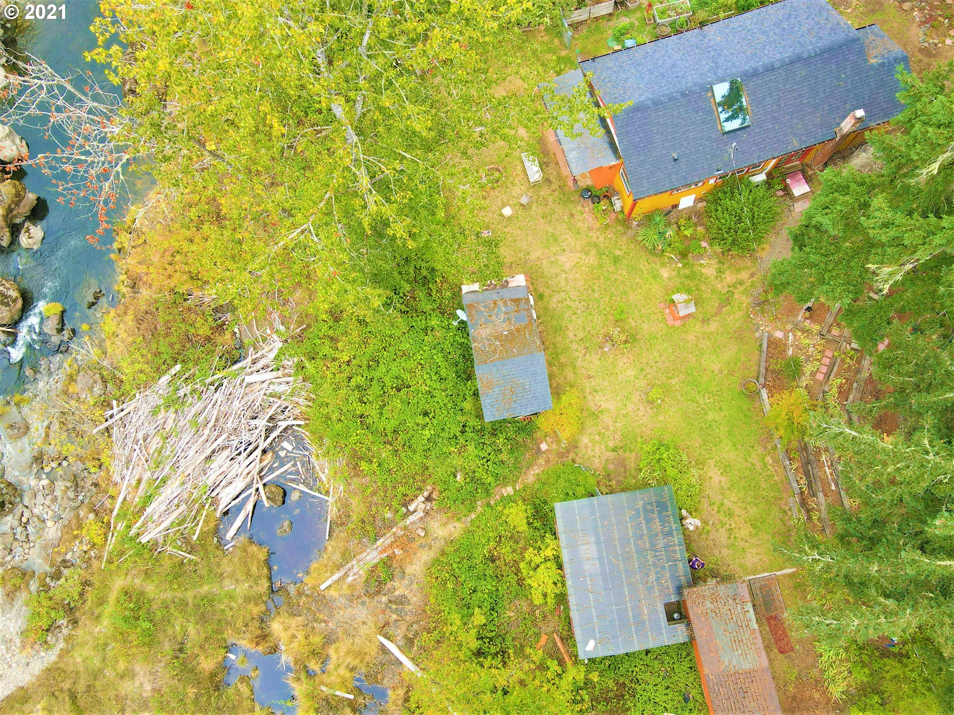 37824 Row River Road Dorena, OR 97434 - Photo 13 of 25 view of a yard with table and chair
