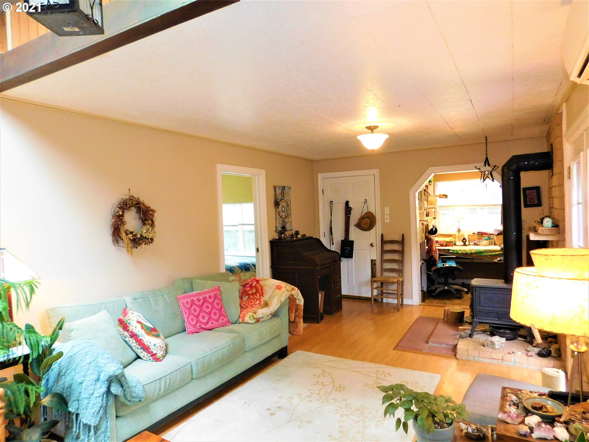 37824 Row River Road Dorena, OR 97434 - Photo 3 of 25 a living room with furniture and a large window