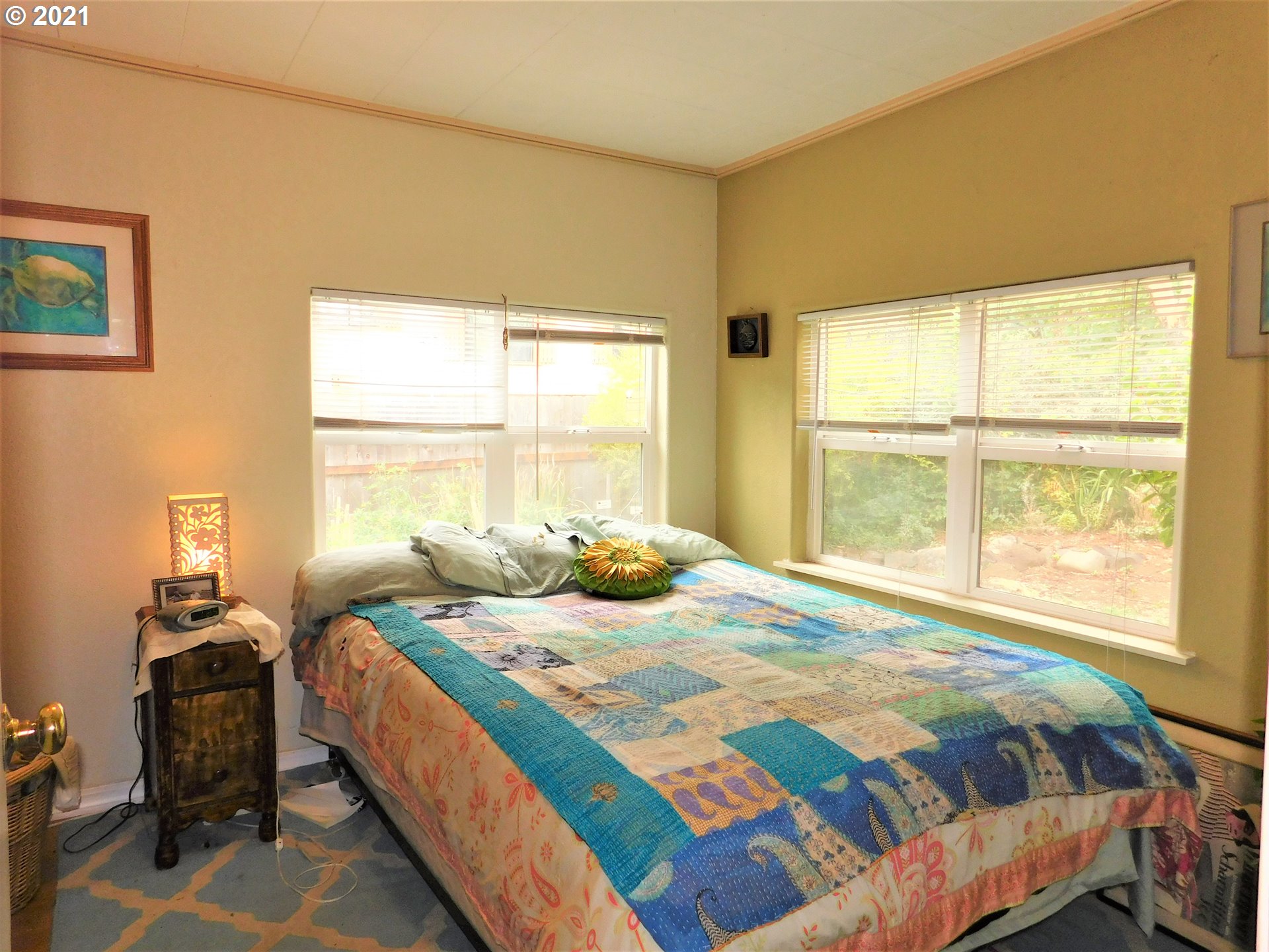 37824 Row River Road Dorena, OR 97434 - Photo 9 of 25 a bedroom with a bed and a window