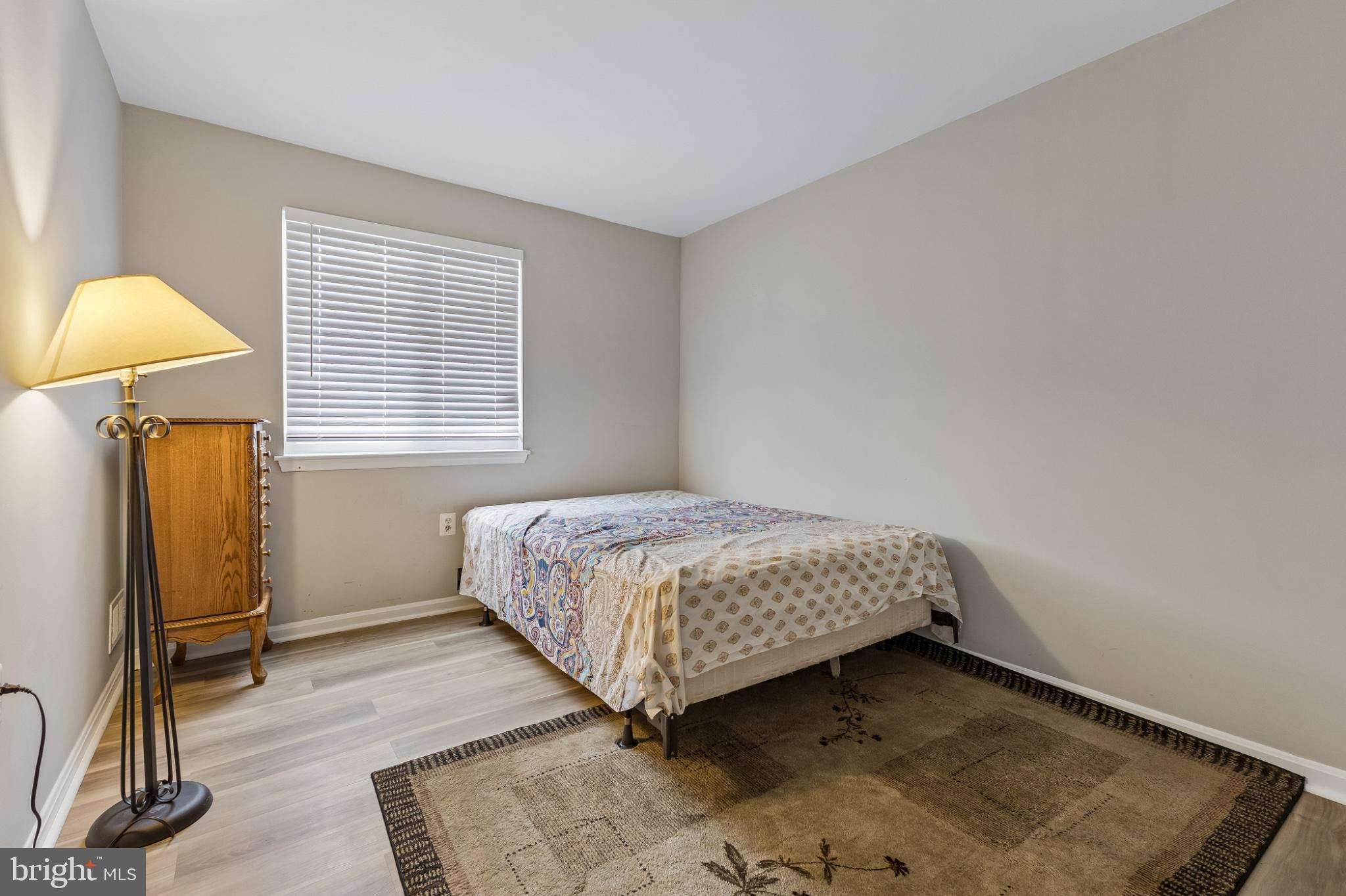 7974 Community Drive Manassas, VA 20109 - Photo 14 of 27 Cozy bedroom with natural light.