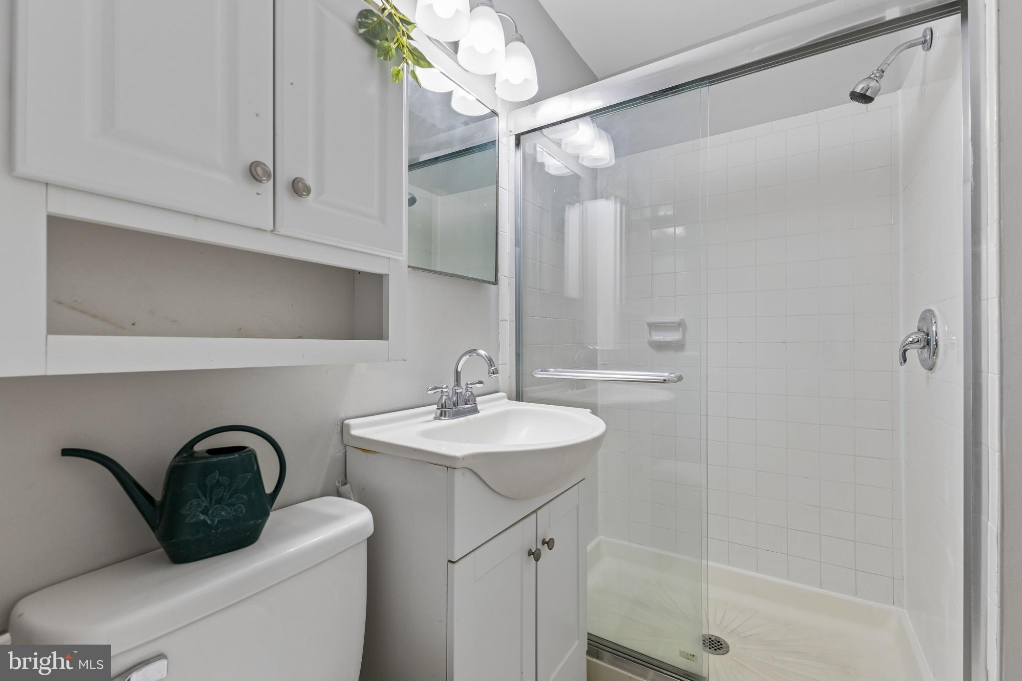7974 Community Drive Manassas, VA 20109 - Photo 22 of 27 Modern bathroom with sleek finishes.
