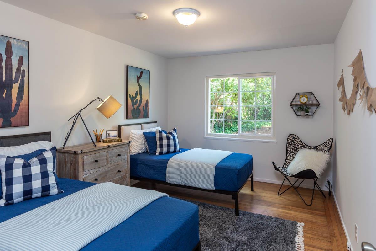 822 Springer Road Los Altos, CA 94024 - Photo 16 of 25 a bedroom with furniture and a window
