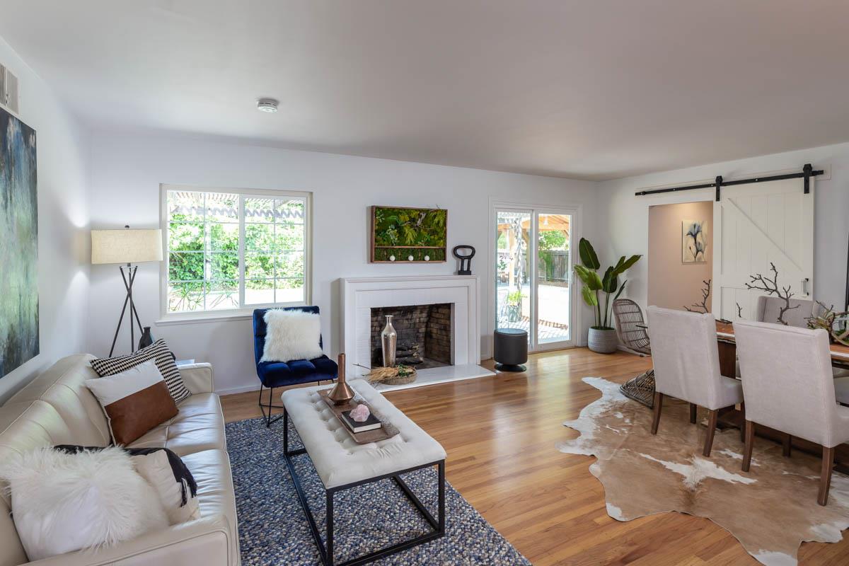 822 Springer Road Los Altos, CA 94024 - Photo 3 of 25 a living room with furniture and a fireplace