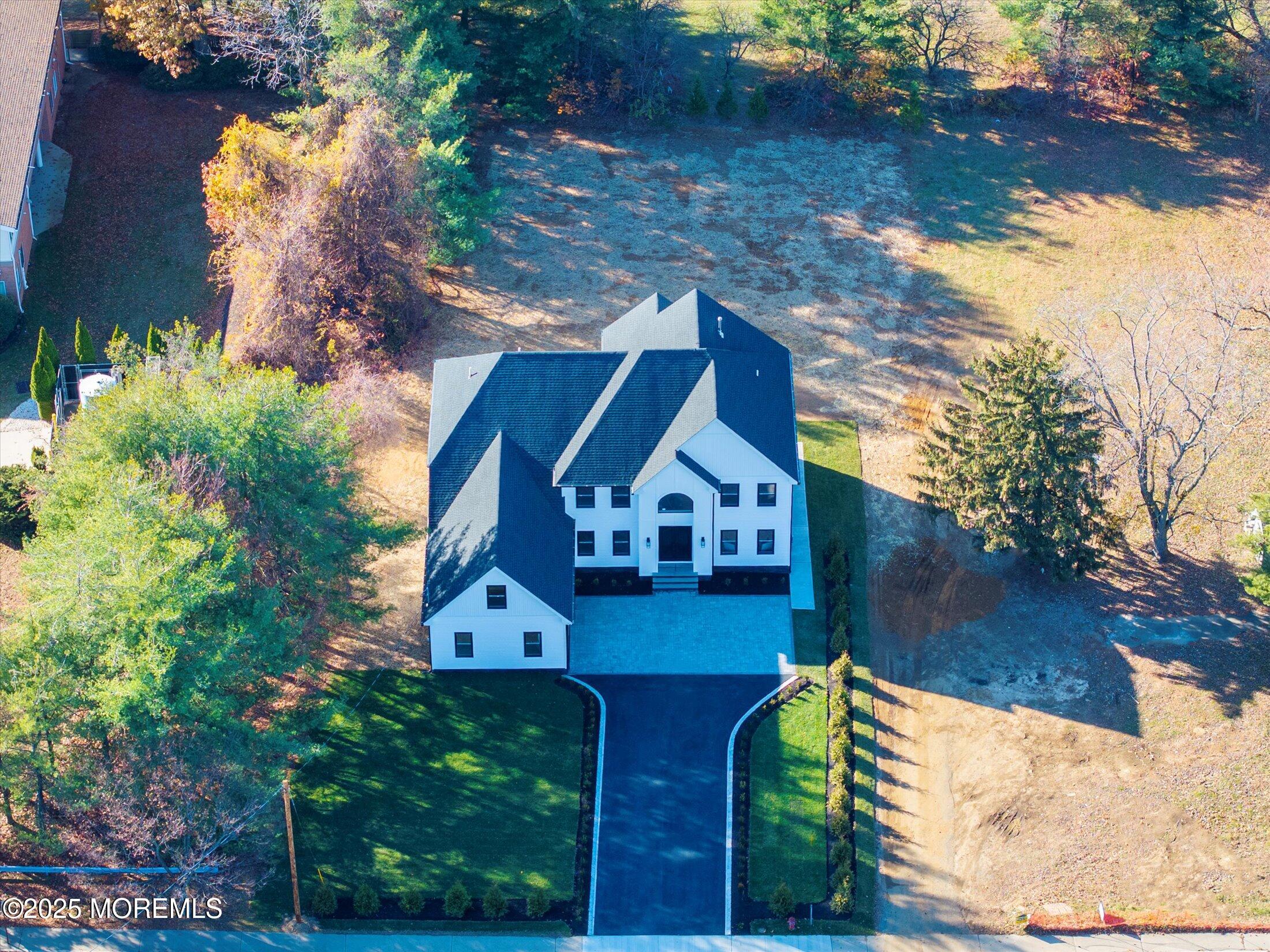 750 Holmdel Road Holmdel, NJ 07733 - Photo 2 of 55 a view of a house with a yard