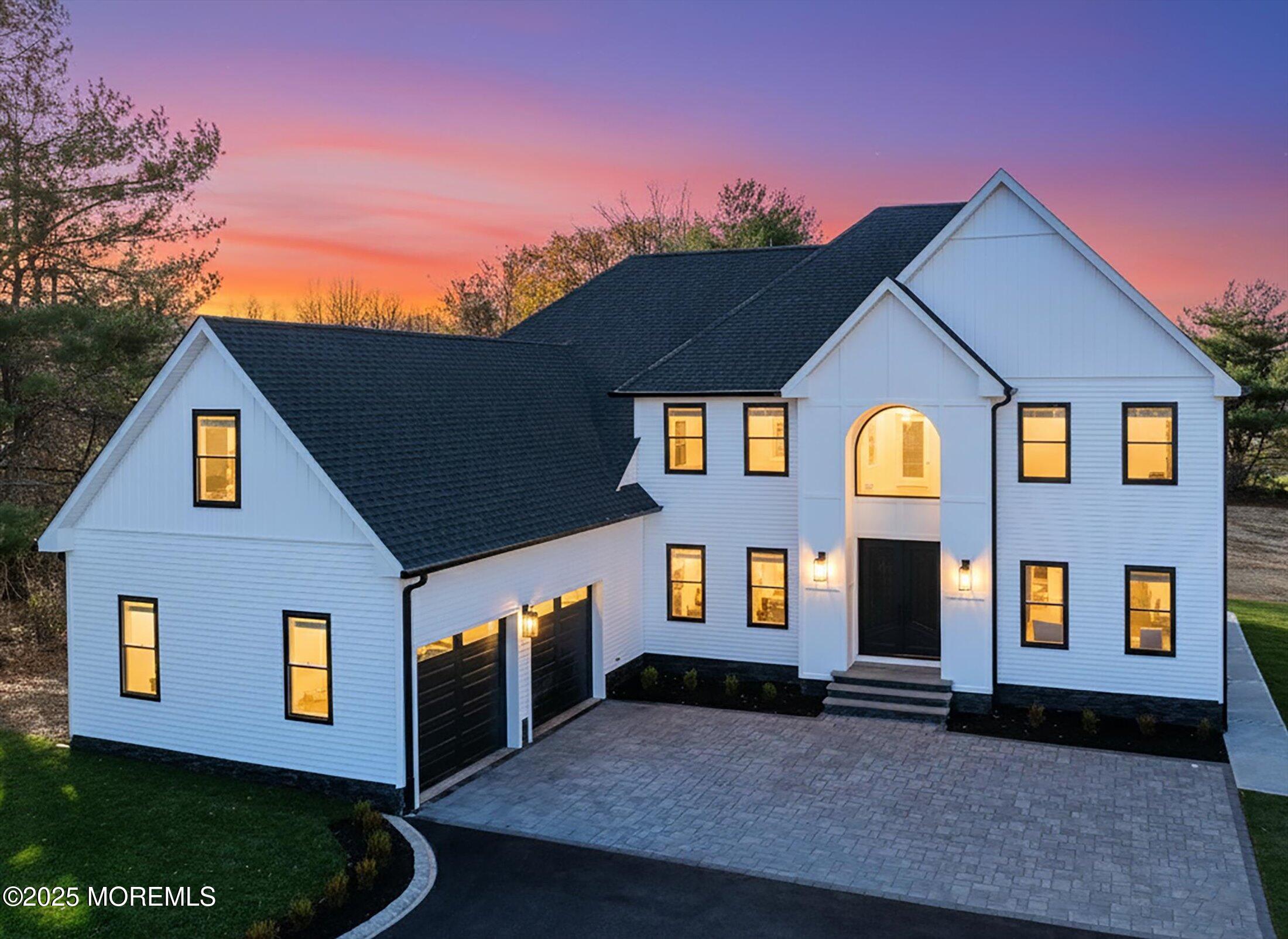 750 Holmdel Road Holmdel, NJ 07733 - Photo 3 of 55 a front view of a house with a yard