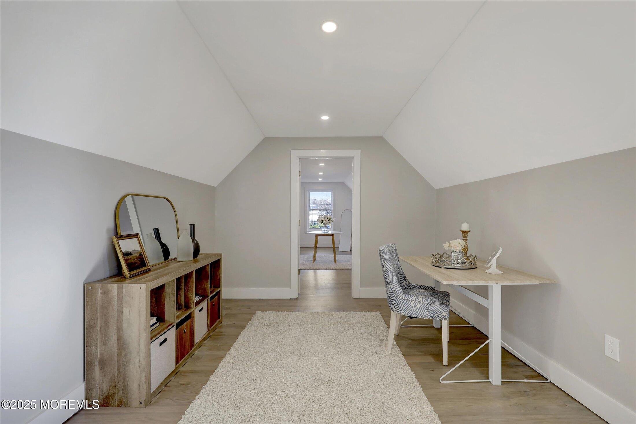 750 Holmdel Road Holmdel, NJ 07733 - Photo 31 of 55 a view of a livingroom with furniture and staircase