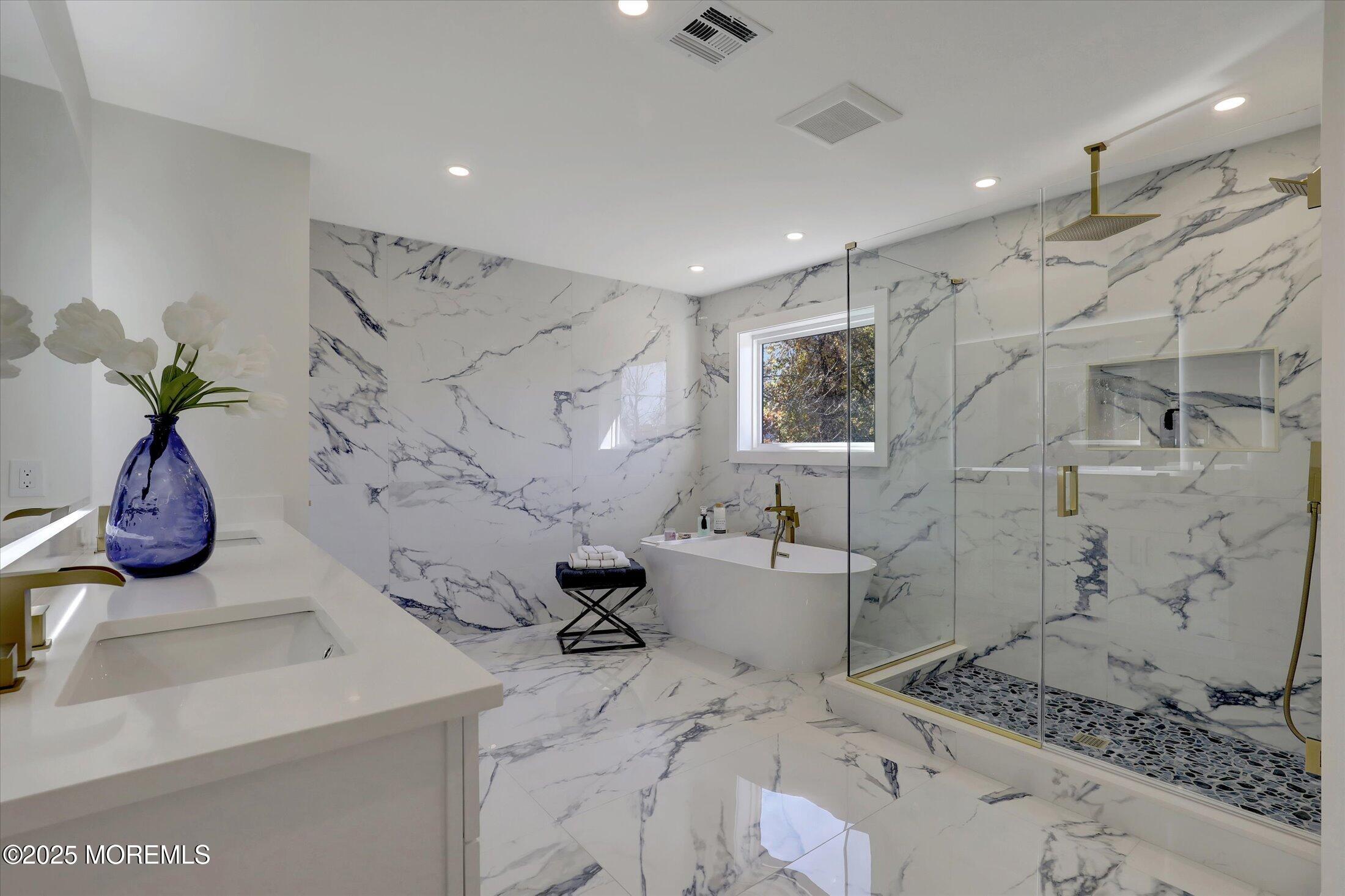 750 Holmdel Road Holmdel, NJ 07733 - Photo 34 of 55 a bath room with a sink and a shower