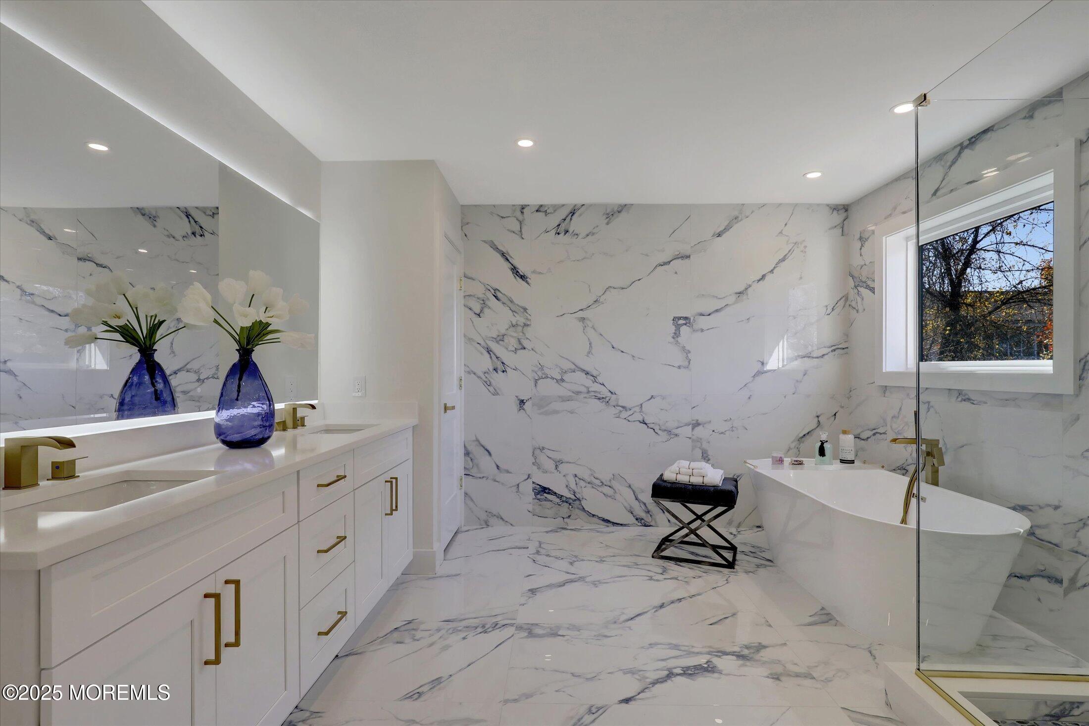 750 Holmdel Road Holmdel, NJ 07733 - Photo 35 of 55 a bathroom with a sink a toilet and shower