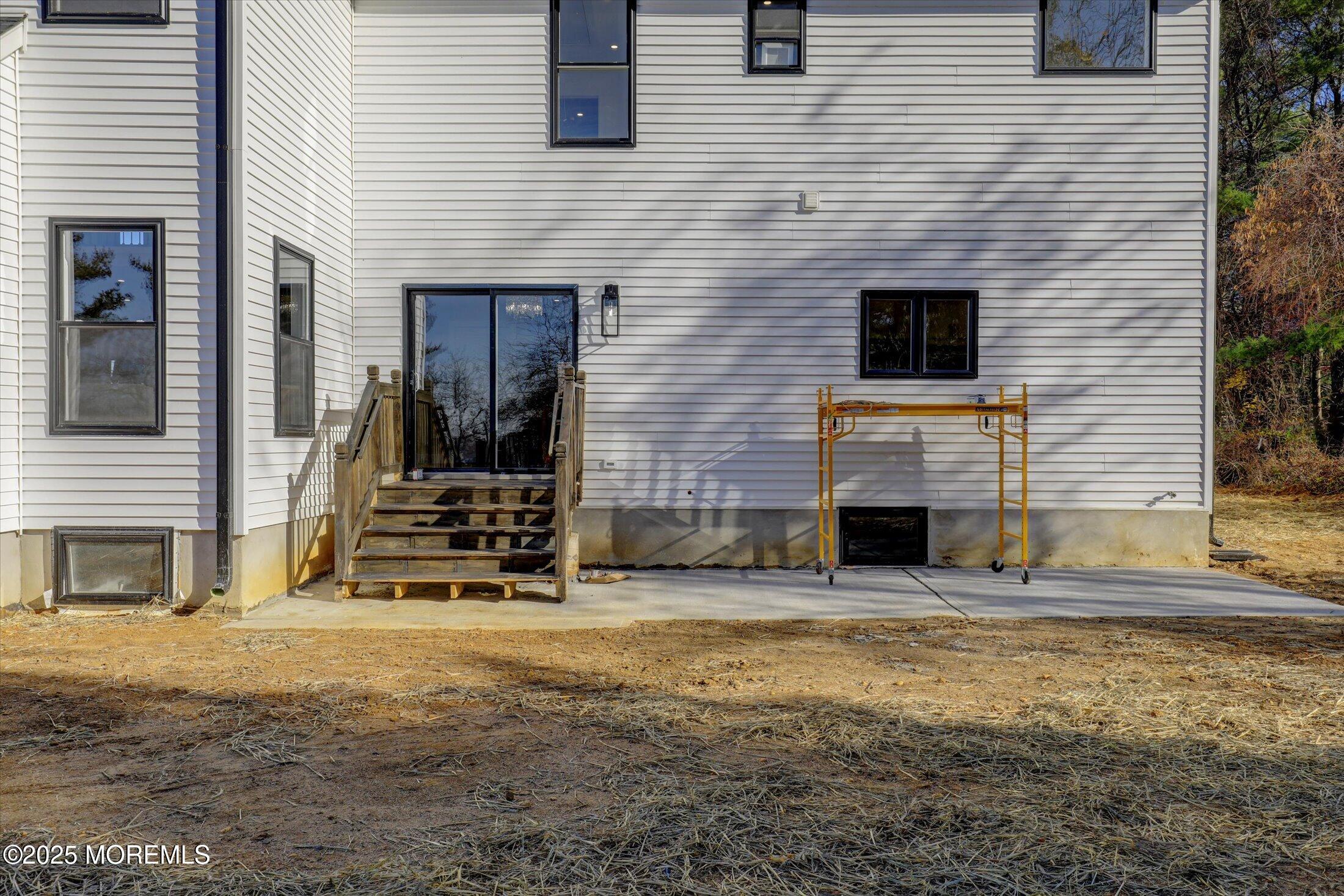 750 Holmdel Road Holmdel, NJ 07733 - Photo 46 of 55 a view of a house with a patio