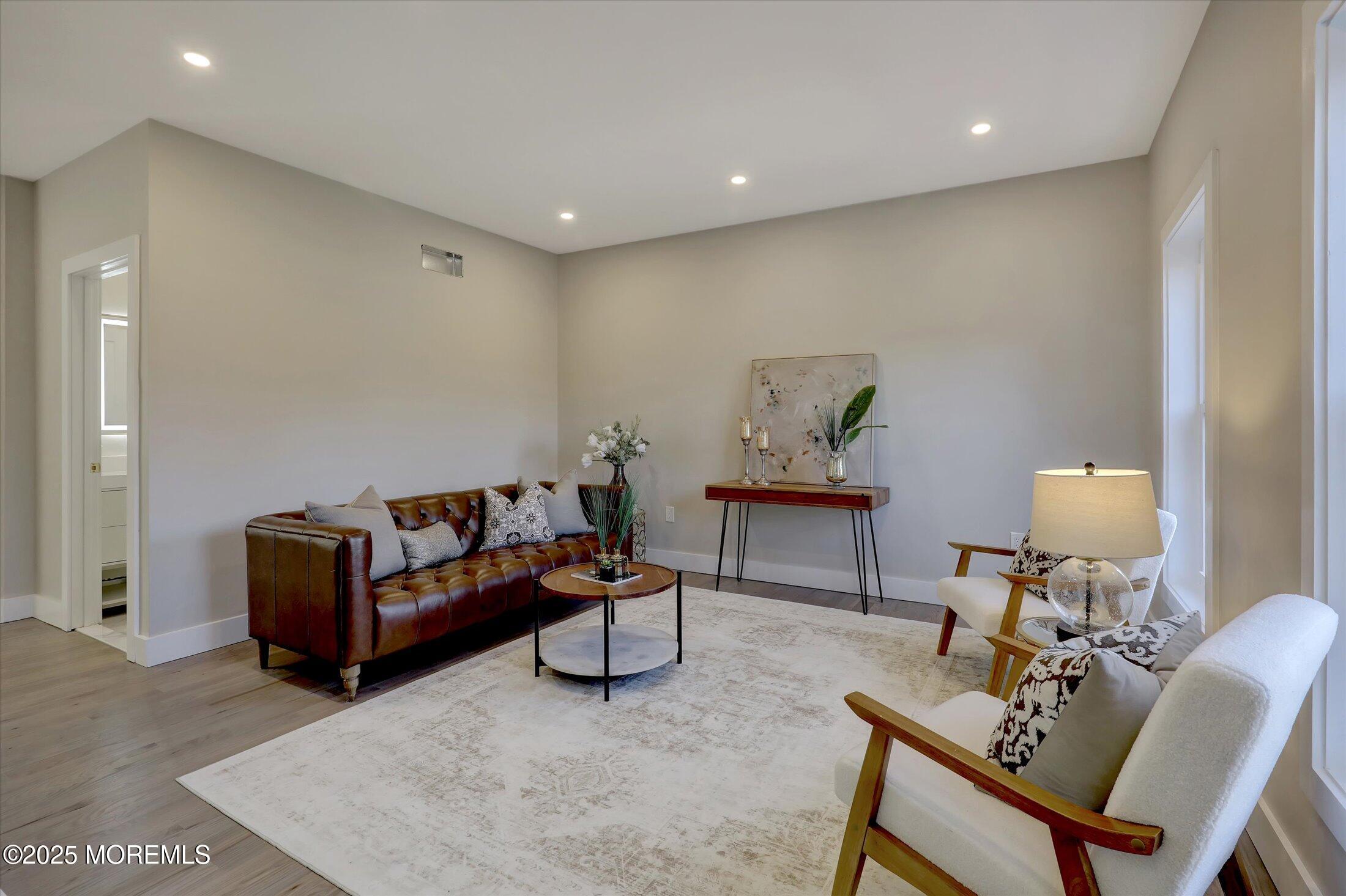 750 Holmdel Road Holmdel, NJ 07733 - Photo 8 of 55 a living room with furniture