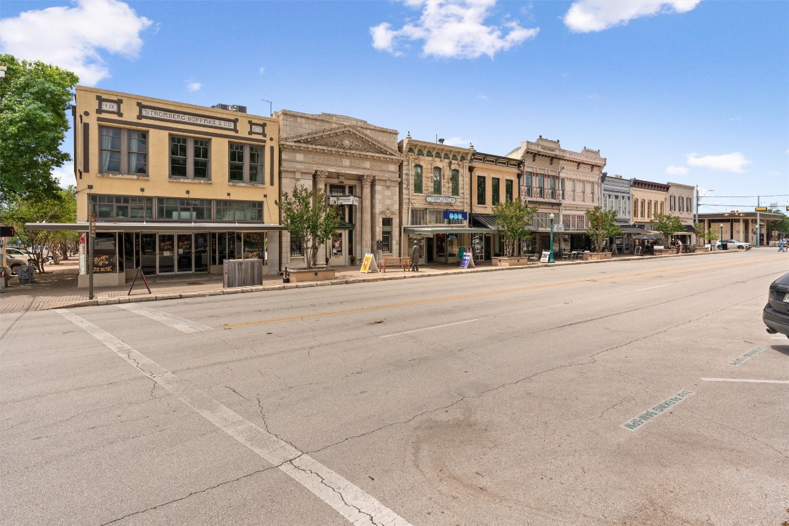 365 County Road 153 Georgetown, TX 78626 - Photo 27 of 35 a front view of a building with a garden and plants