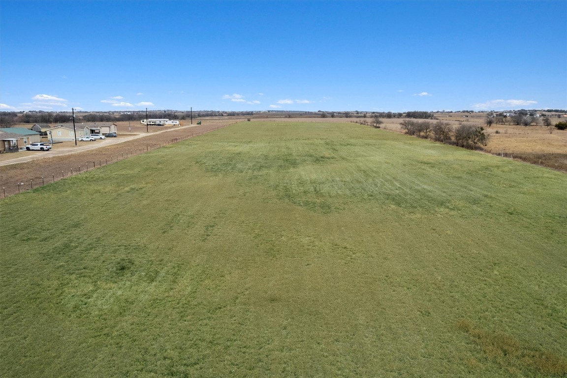 365 County Road 153 Georgetown, TX 78626 - Photo 9 of 35 a view of an ocean beach and a yard
