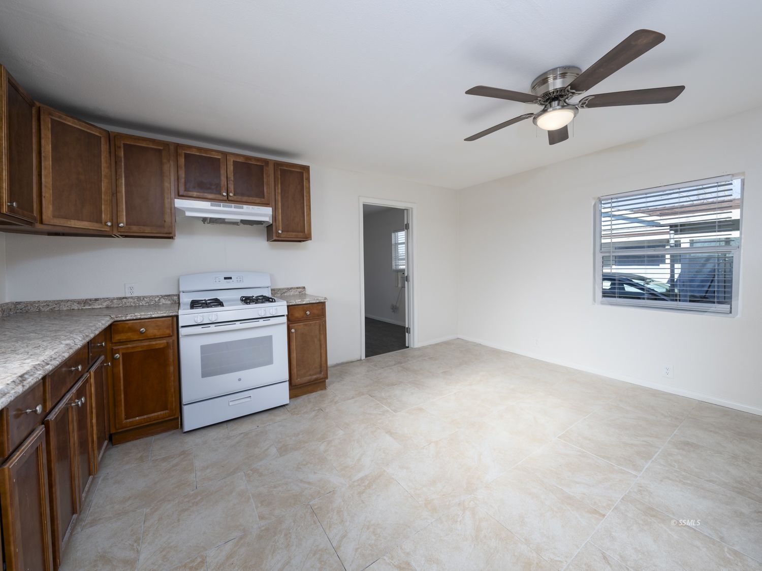 419 West Haloid Avenue Ridgecrest, CA 93555 - Photo 3 of 29 a kitchen with stainless steel appliances a stove top oven a sink a counter top space and cabinets