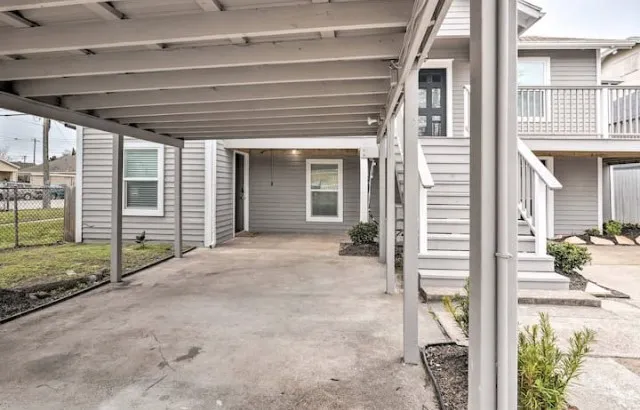 a view of a house with wooden floor and roof