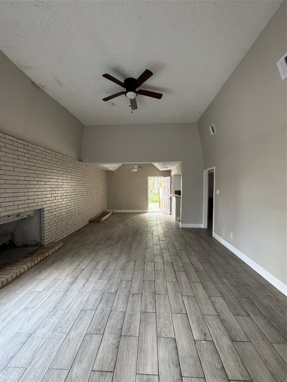 8100 Leonora Street, Unit K3 Houston, TX 77061 - Photo 2 of 15 a view of empty room with wooden floor and fan