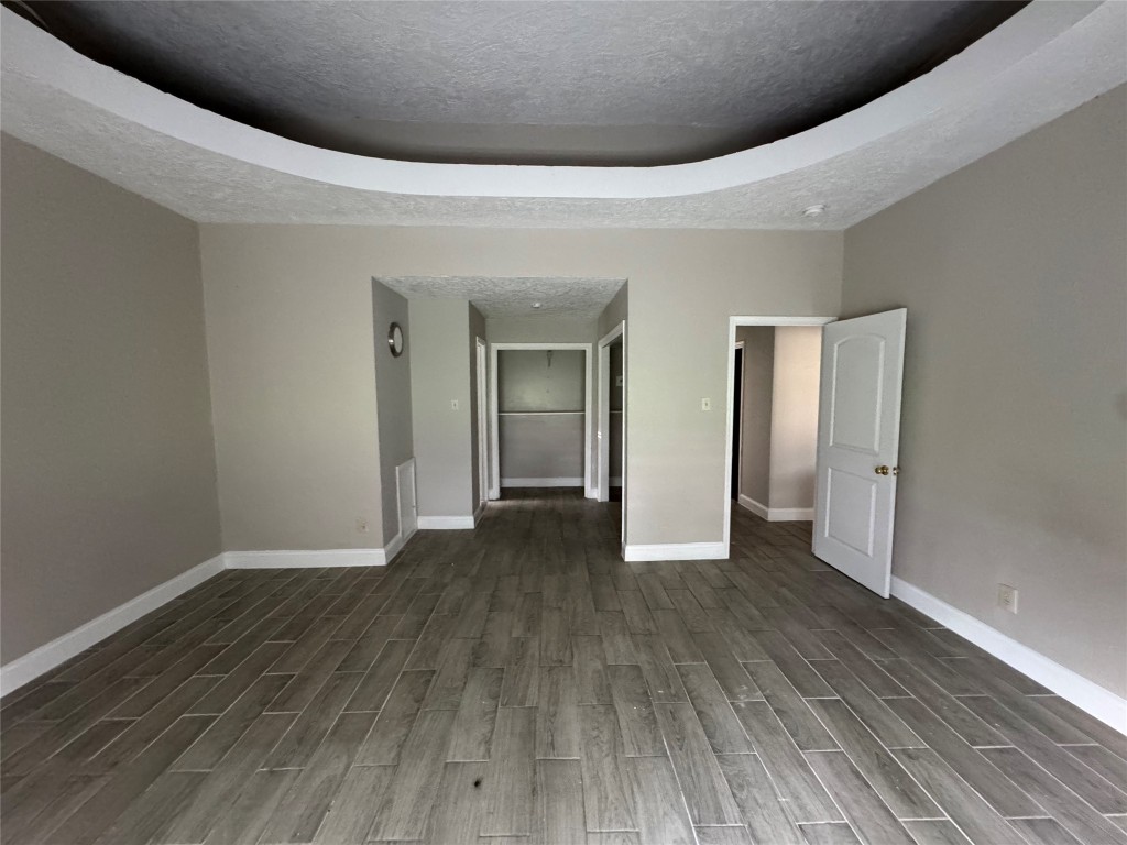 8100 Leonora Street, Unit K3 Houston, TX 77061 - Photo 8 of 15 a view of a livingroom with wooden floor