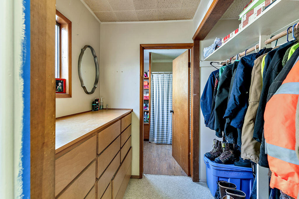 4832 Anderson Creek Road Talent, OR 97540 - Photo 18 of 39 a view of walk in closet with clothes and shoes