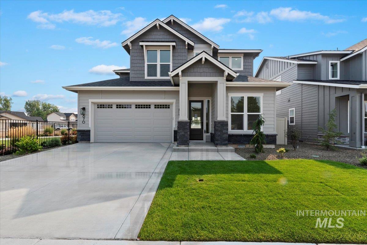 677 North Morning Glory Way Eagle, ID 83616 - Photo 1 of 29 Craftsman inspired home with driveway, stone siding, and a shingled roof
