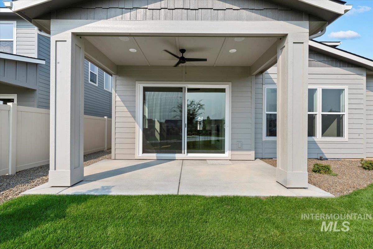 677 North Morning Glory Way Eagle, ID 83616 - Photo 28 of 29 Back of property with a ceiling fan and a patio