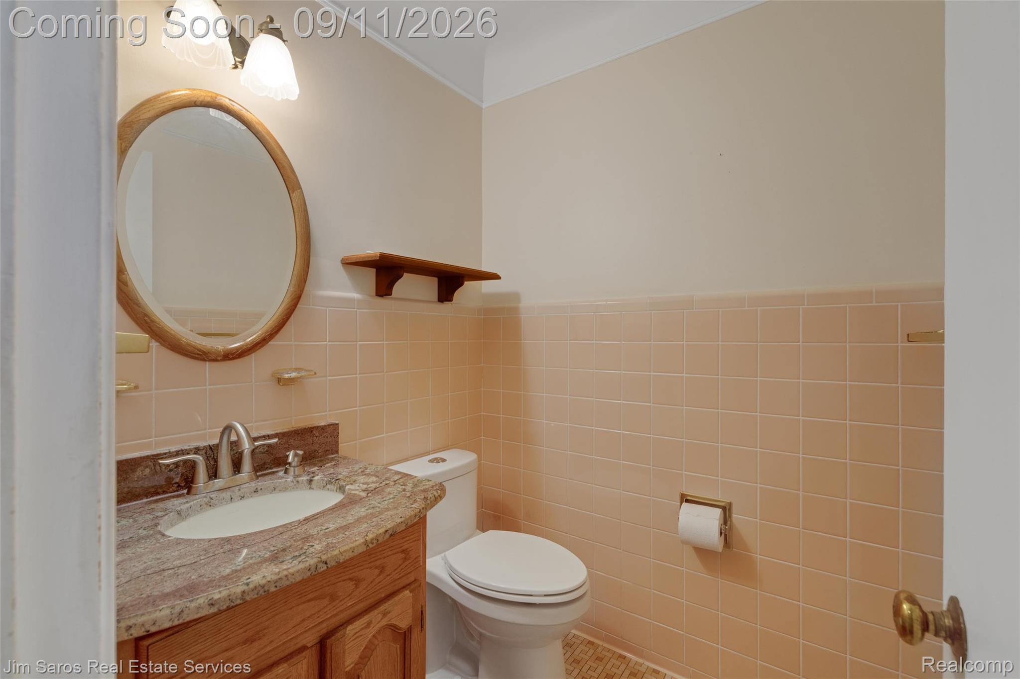 1445 Devonshire Road Grosse Pointe, MI 48230 - Photo 11 of 30 Vanity with a polished stone countertop, oval sink, and brushed nickel faucet