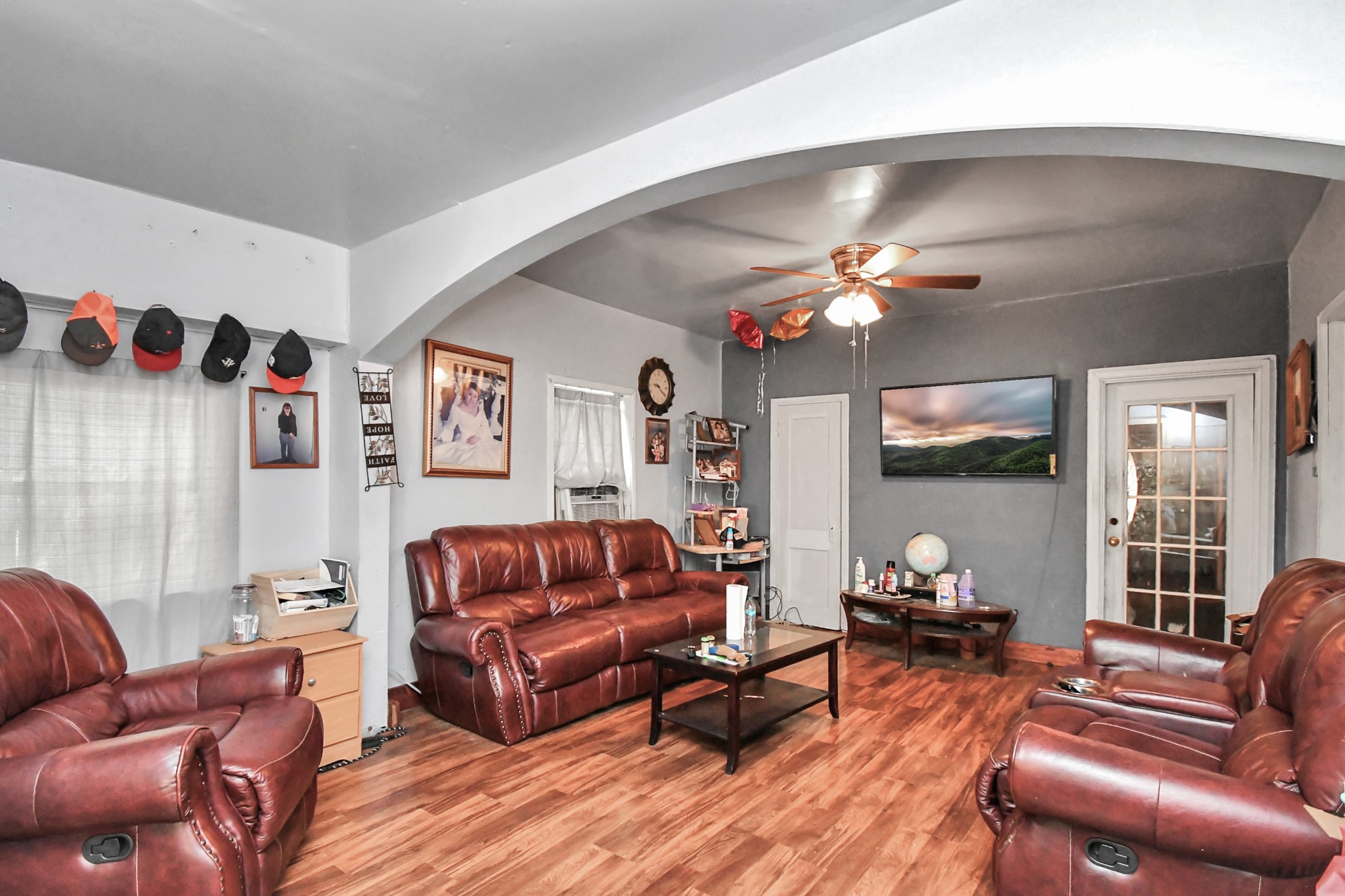 7908 John Street Houston, TX 77012 - Photo 11 of 30 a living room with furniture and wooden floor