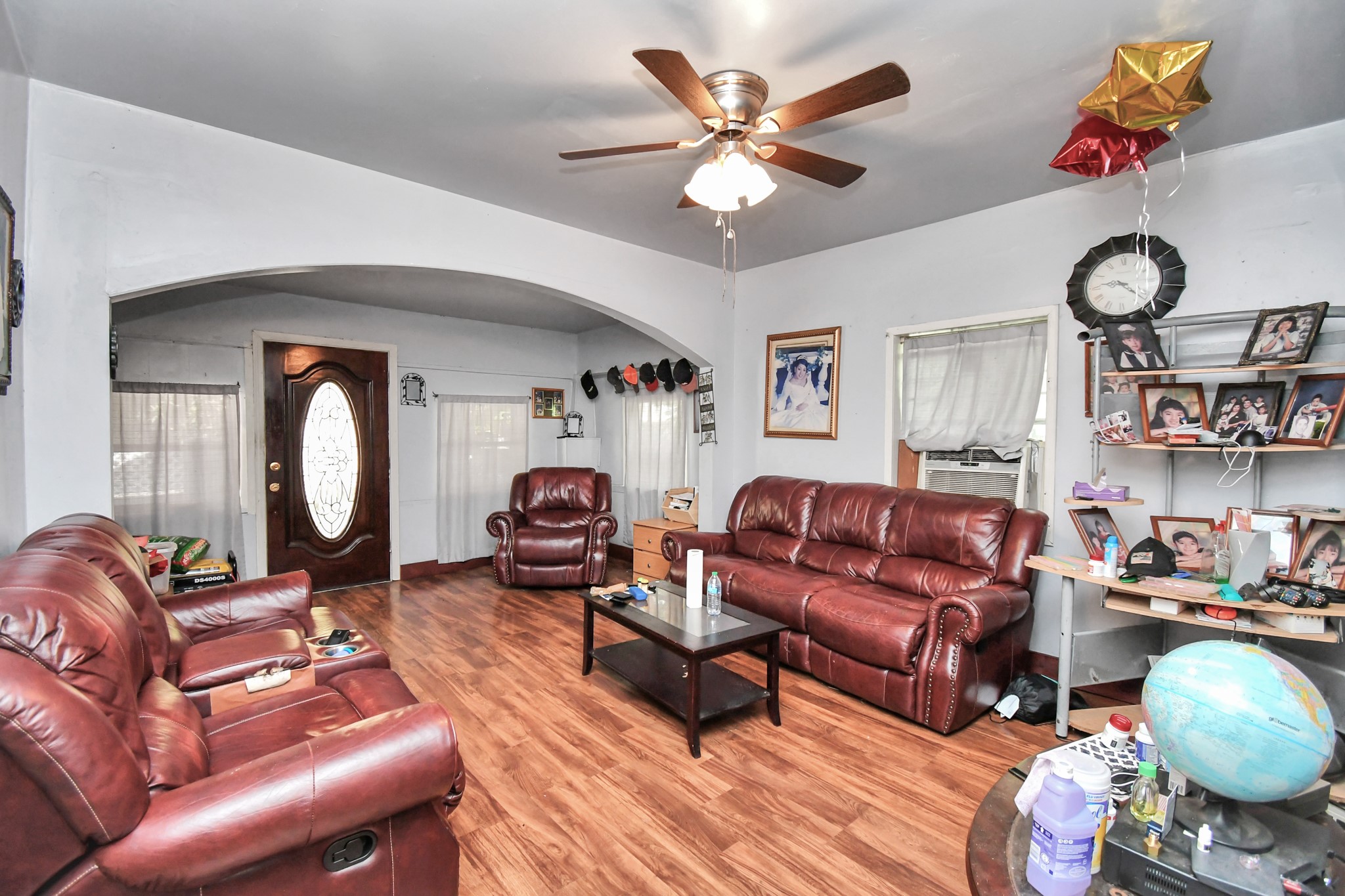 7908 John Street Houston, TX 77012 - Photo 15 of 30 a living room with furniture a rug and a window