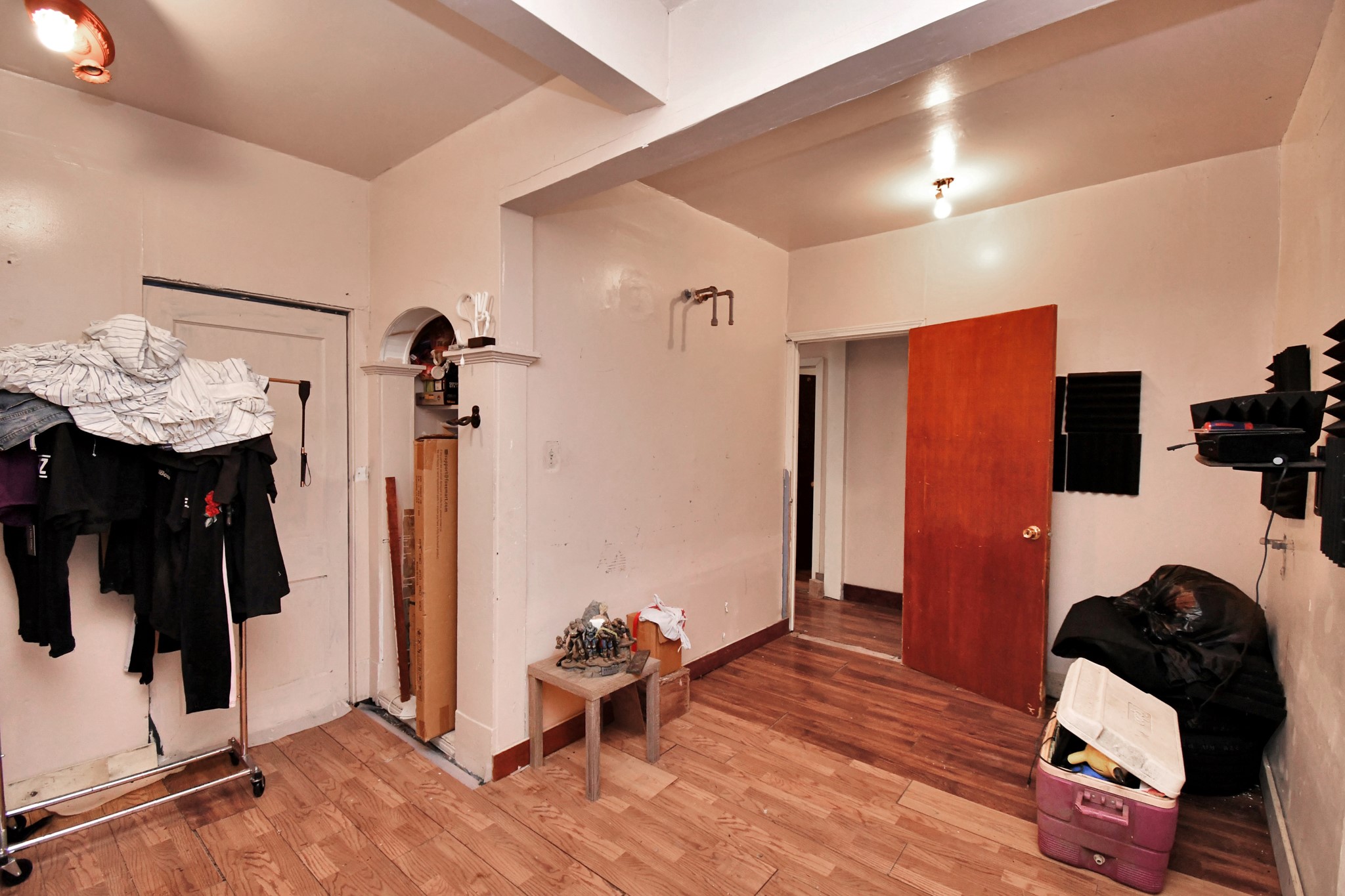 7908 John Street Houston, TX 77012 - Photo 25 of 30 a room with furniture and wooden floor