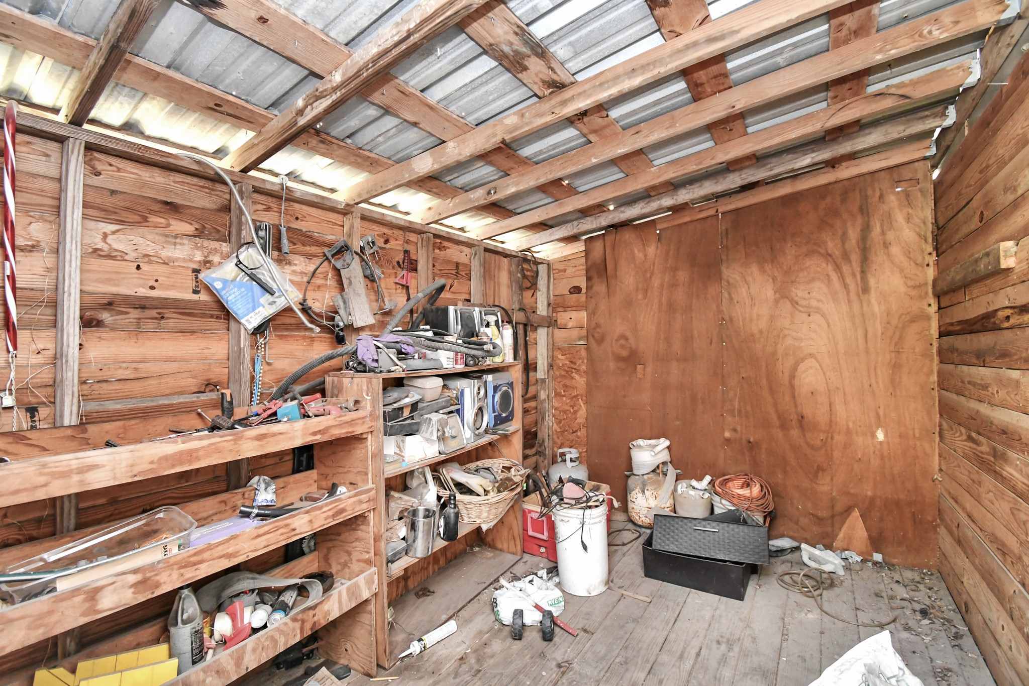 7908 John Street Houston, TX 77012 - Photo 8 of 30 a view of entryway with wooden walls