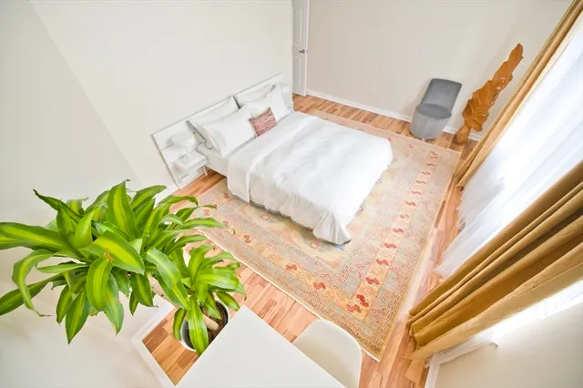 a view of a staircase with white walls