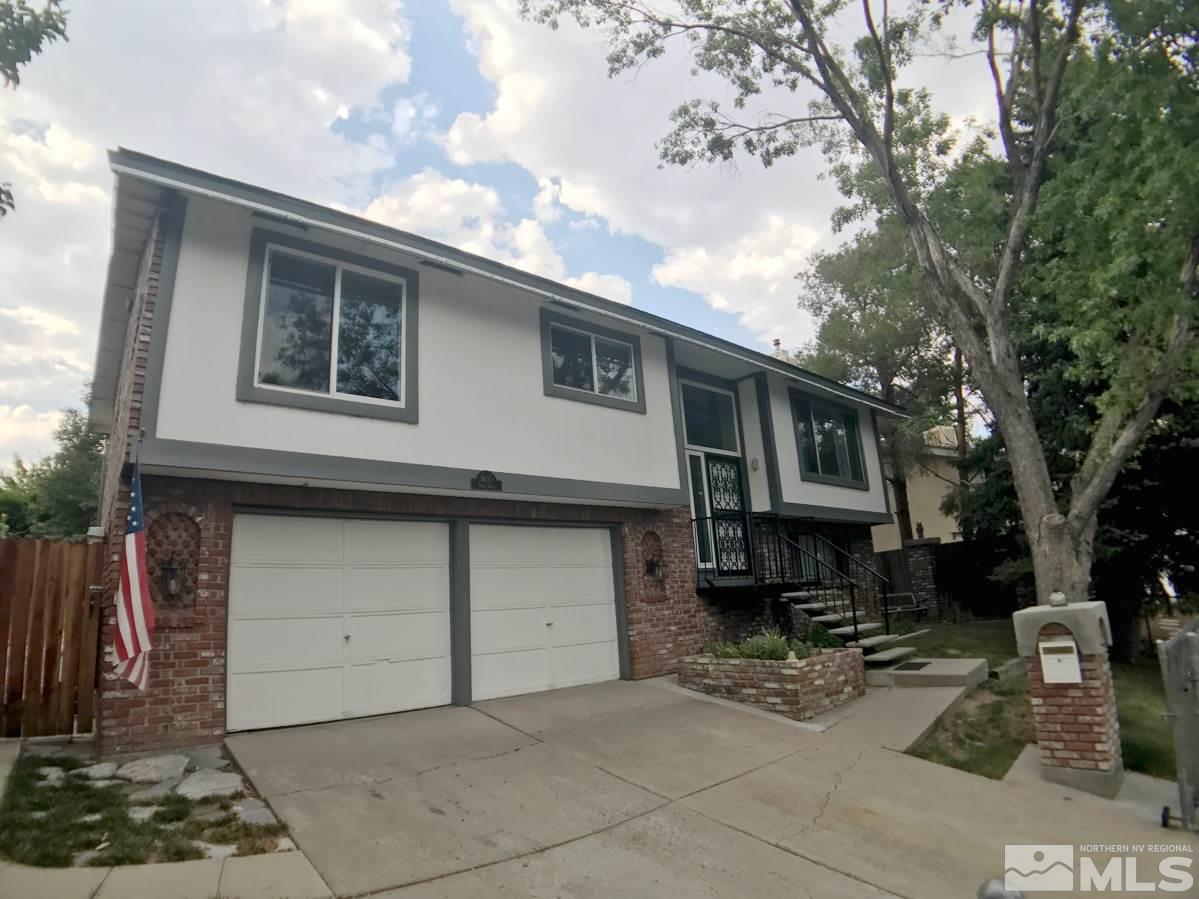3635 Pomo Drive Reno, NV 89503 - Photo 1 of 1 a front view of a house with parking space