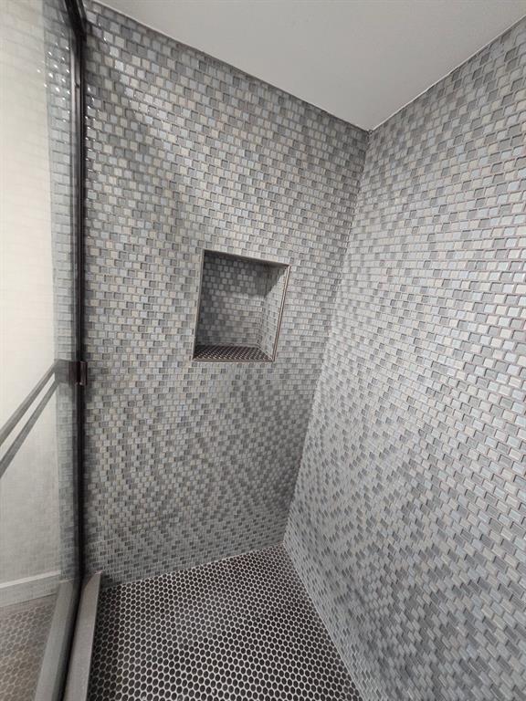 903 Northwest 33rd Avenue Gainesville, FL 32609 - Photo 12 of 23 a bathroom with a shower