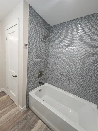 a bathroom with a bathtub