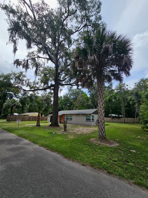 903 Northwest 33rd Avenue Gainesville, FL 32609 - Photo 18 of 23 a view of a park with large trees