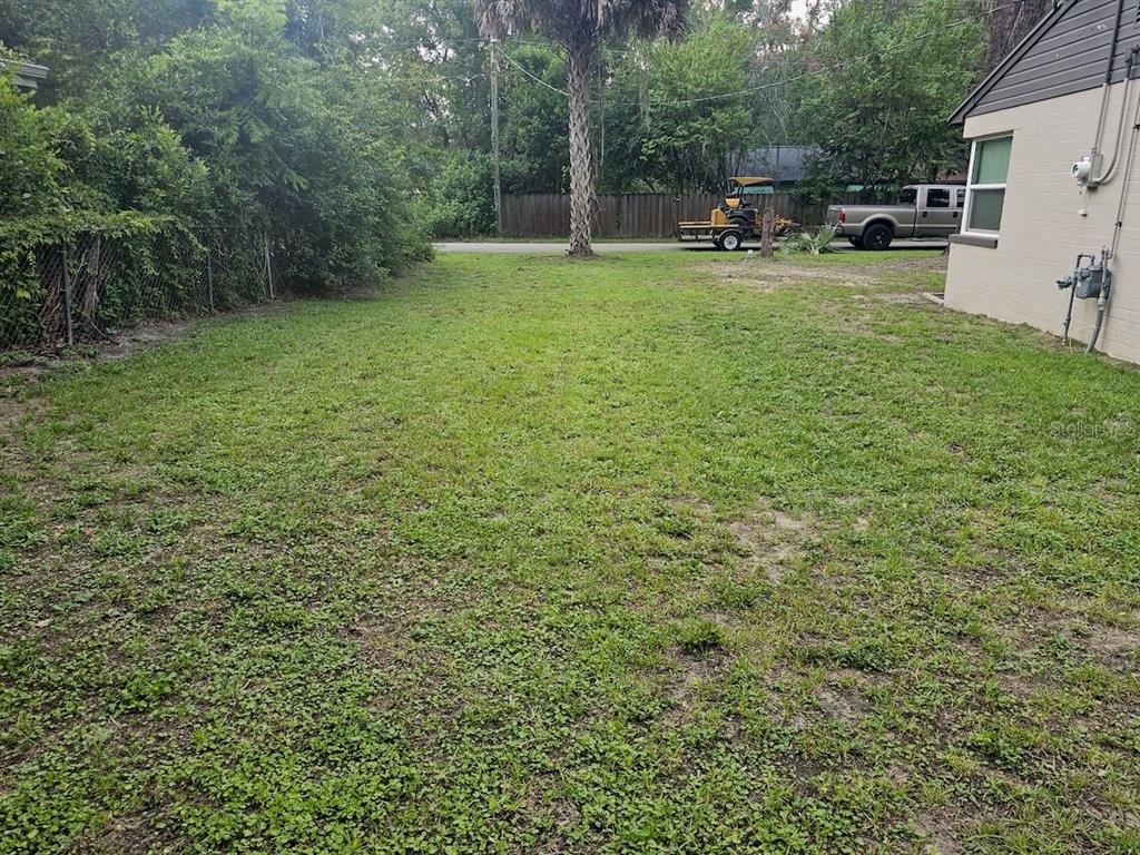903 Northwest 33rd Avenue Gainesville, FL 32609 - Photo 21 of 23 a view of park with bench and trees