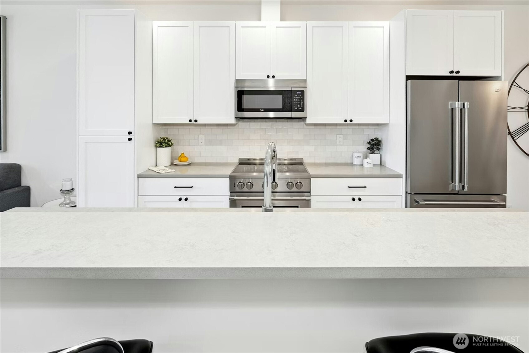 18512 Wallingford Avenue North Shoreline, WA 98133 - Photo 13 of 32 a kitchen with appliances cabinets and a counter top space
