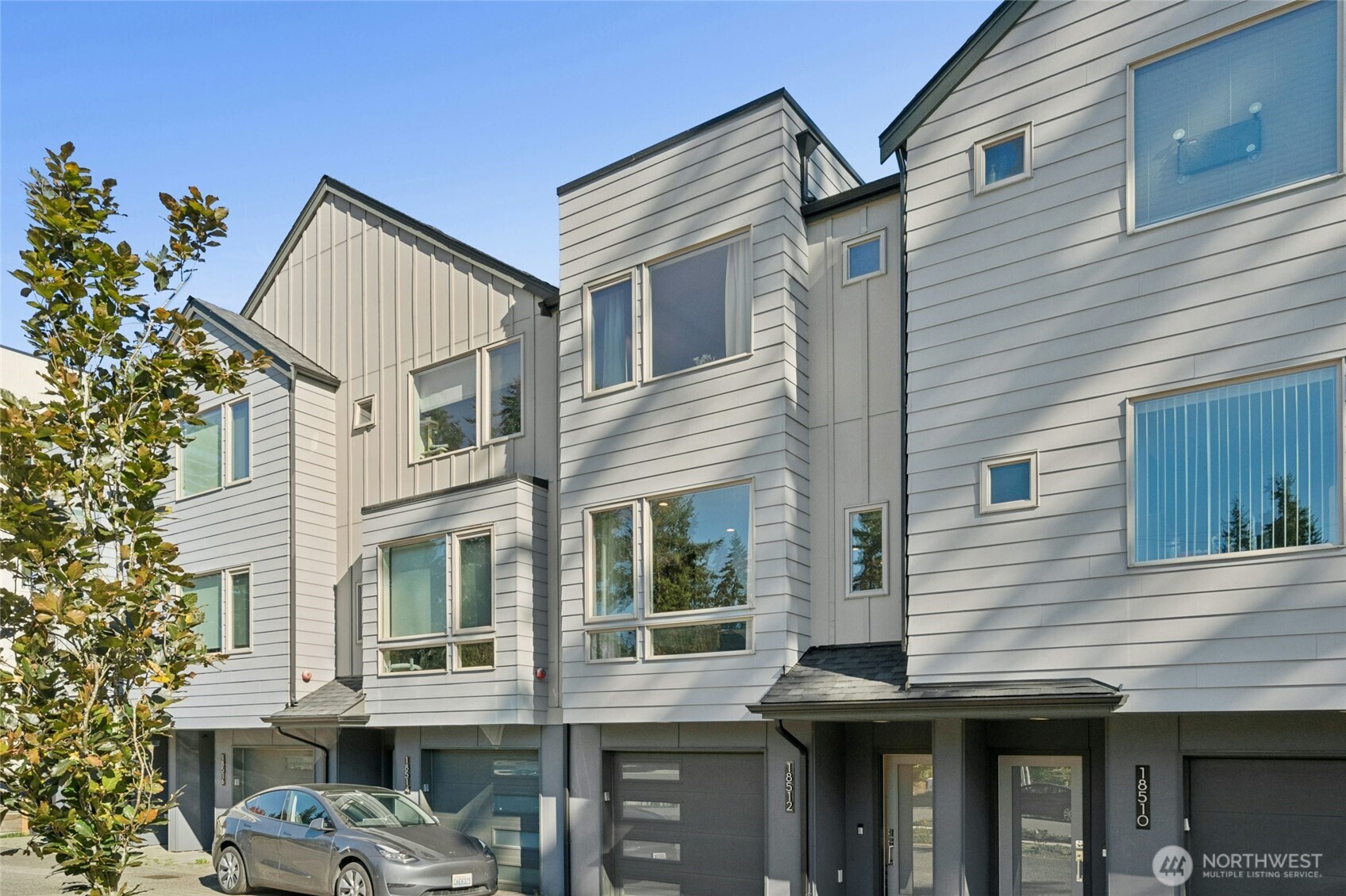 18512 Wallingford Avenue North Shoreline, WA 98133 - Photo 2 of 32 a view of a house with a yard and deck