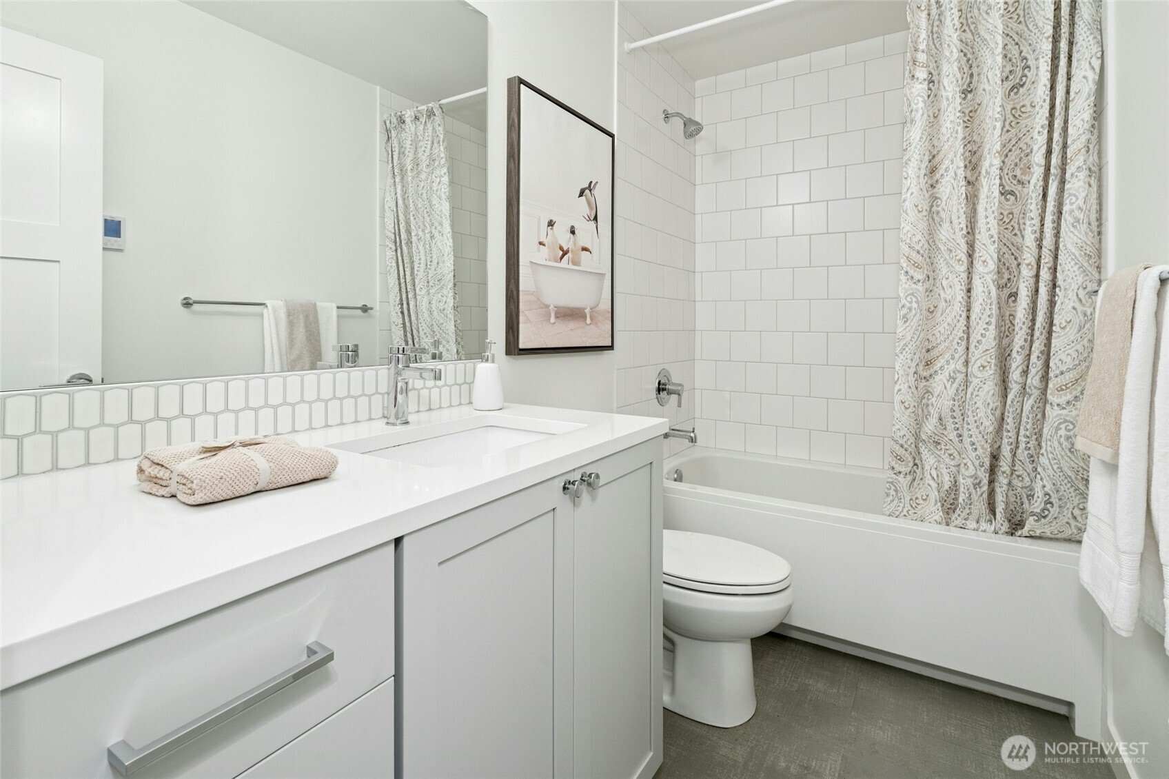 18512 Wallingford Avenue North Shoreline, WA 98133 - Photo 24 of 32 a bathroom with a granite countertop sink toilet and shower