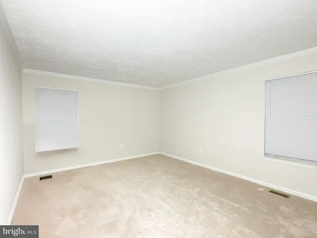 an empty room with a workbench