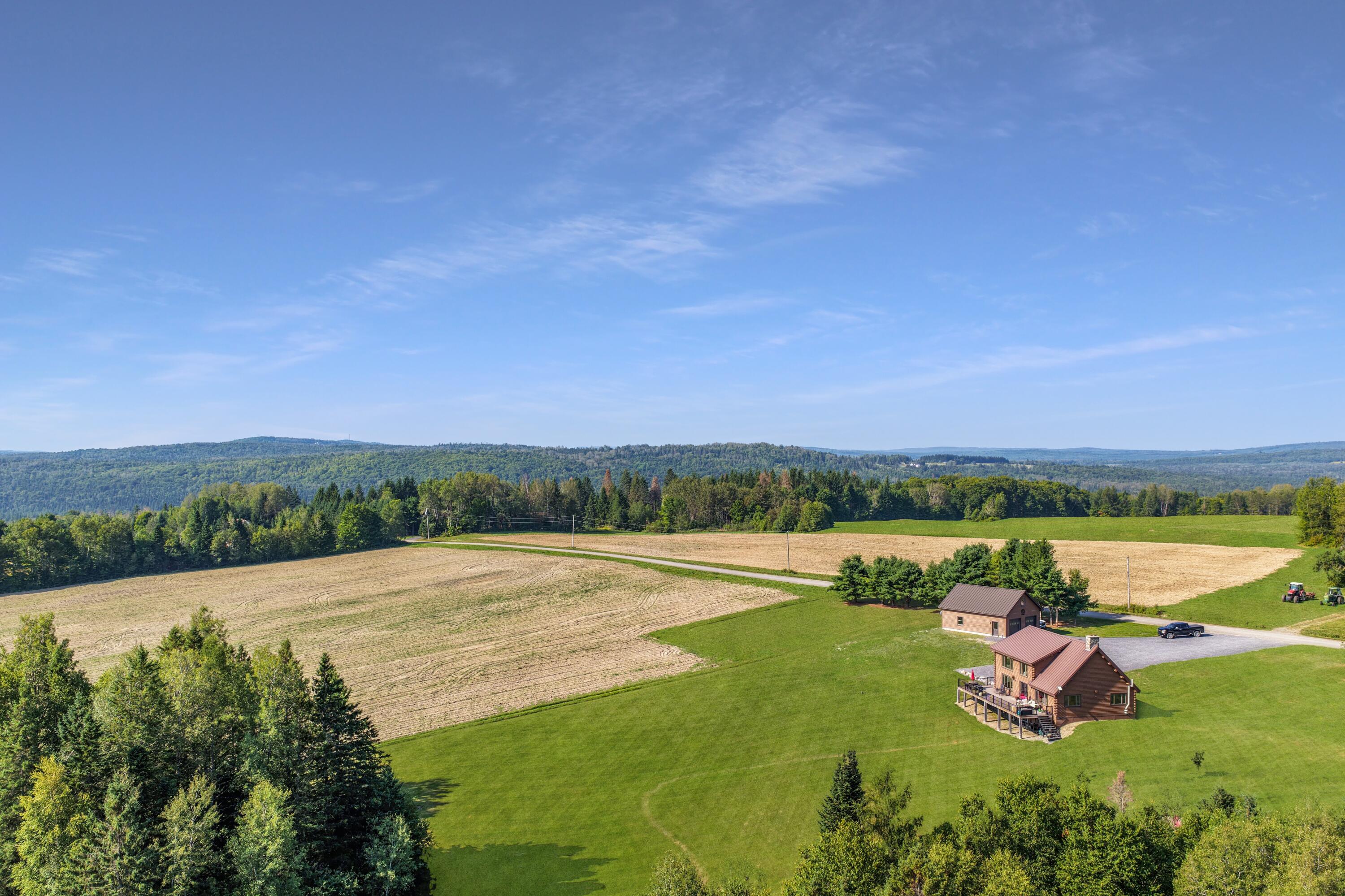 112 Schooland Road New Sweden, ME 04762 - Photo 2 of 64 DJI_20250813212359_0041_D