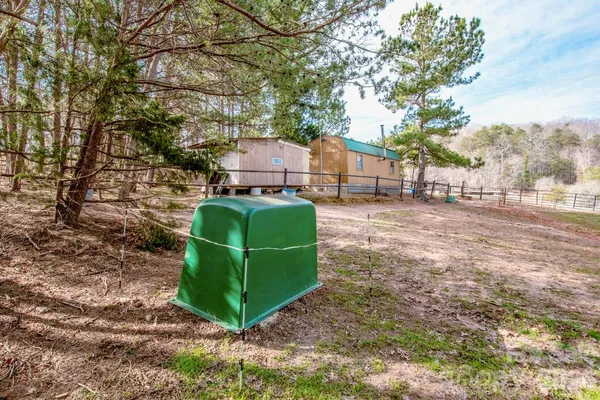a front view of a house with a outdoor space