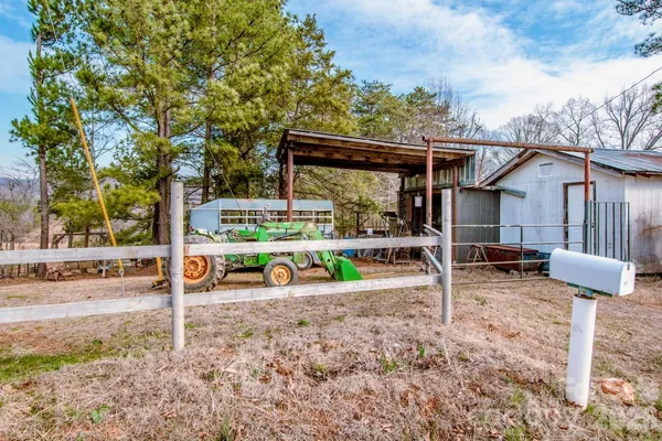 a view of an empty room with wooden walls