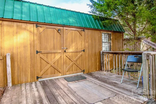 a view of a house with a large window