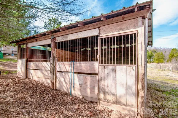a room with lots of appliances and furniture