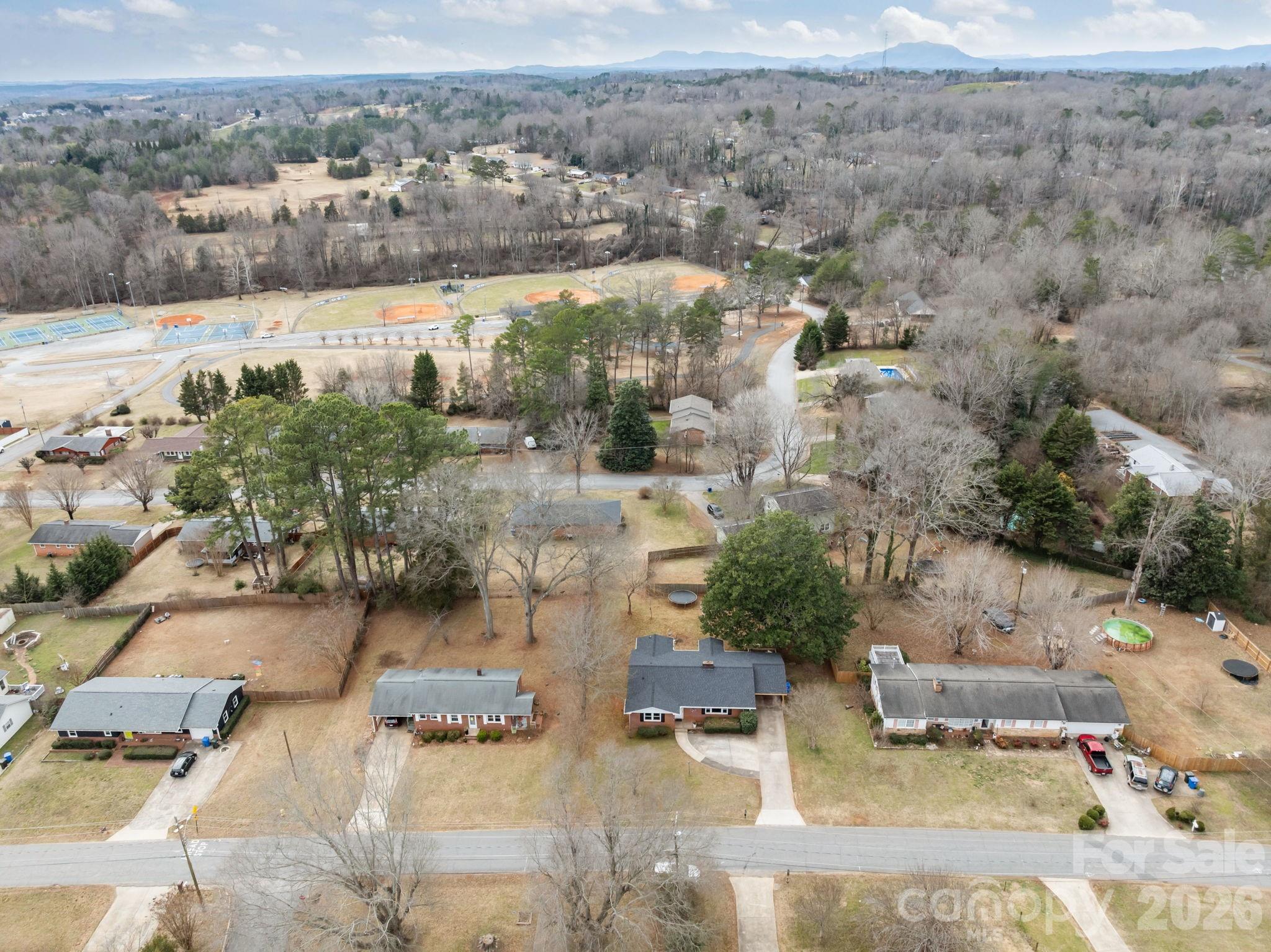 275 Tanner Street Rutherfordton, NC 28139 - Photo 14 of 44 an aerial view of residential houses with outdoor space